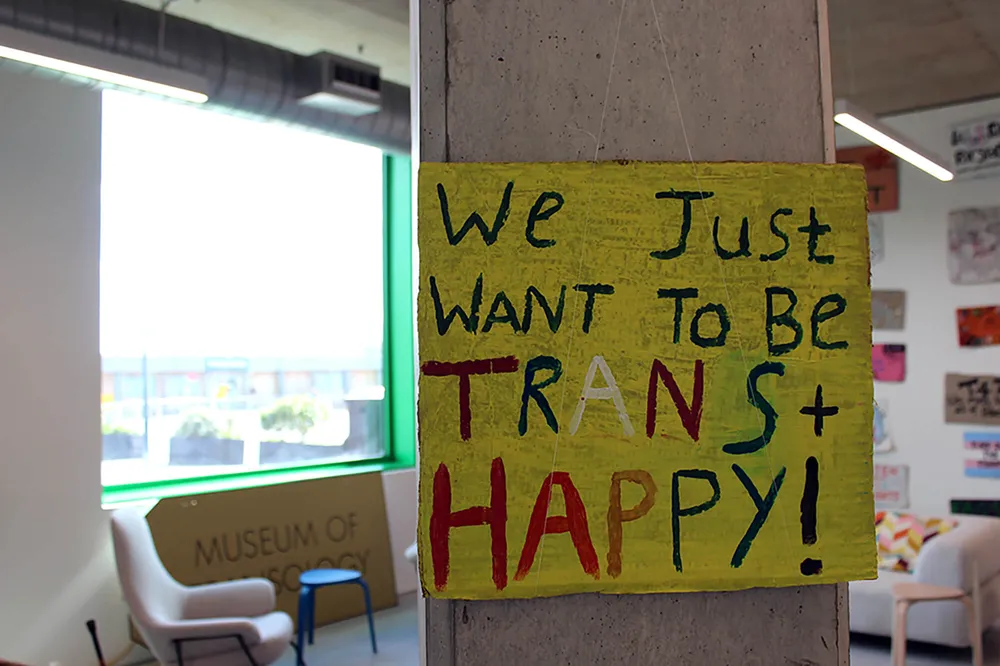 A placard reading 'We just want to be Trans and Happy'