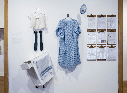 A wall with hospital items hung on it