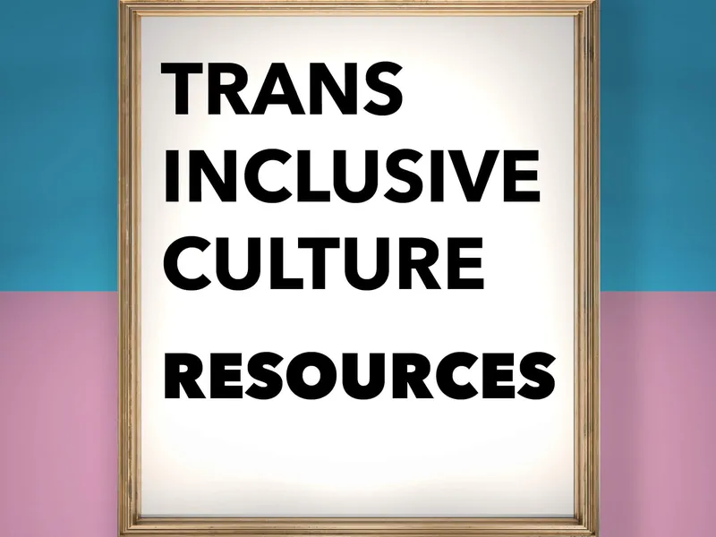 A picture frame with trans inclusive culture resources written on it and a pink and blue wall behind it.